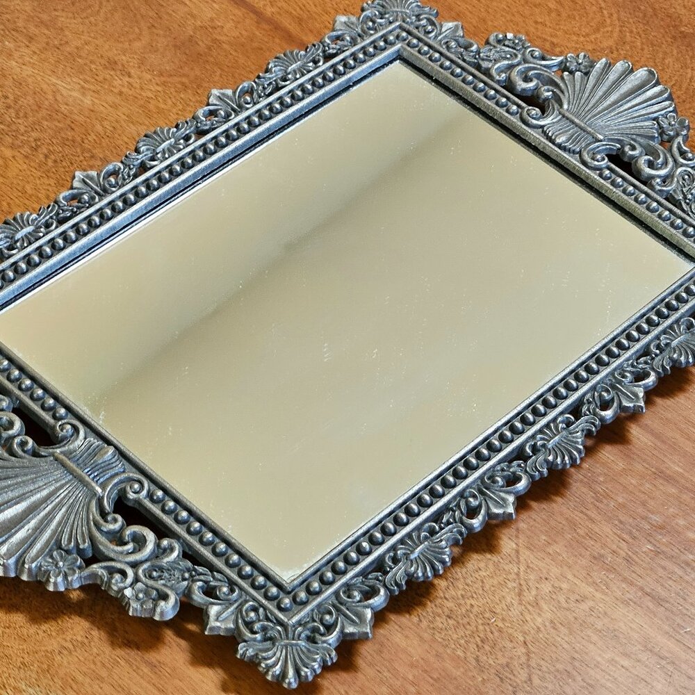 beautiful vintage ornate mirror has hook for hanging